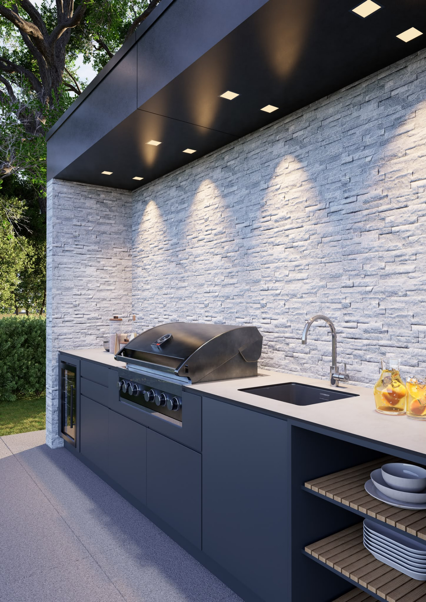 Eleexa navy-fronted kitchen with stacked-stone backsplash