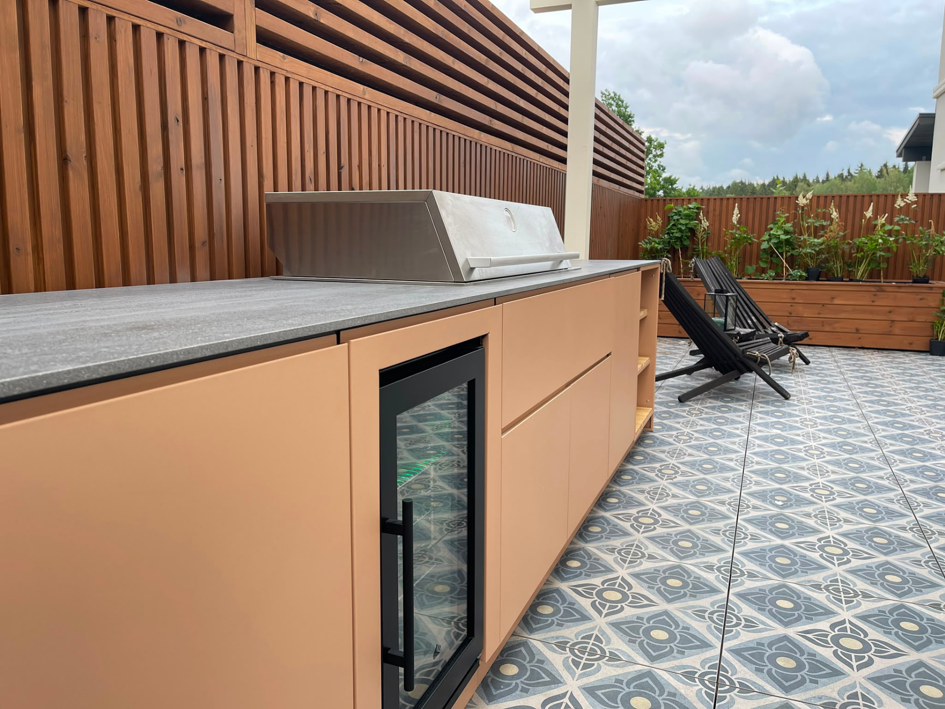 Eleexa terracotta-fronted module with black stone worktop